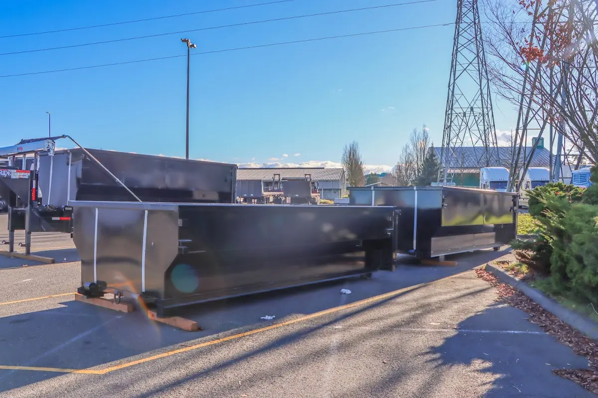 Roll-off dumpster ready for waste disposal at job site for Estate Cleanout Dumpster Rental in Country Club Estates